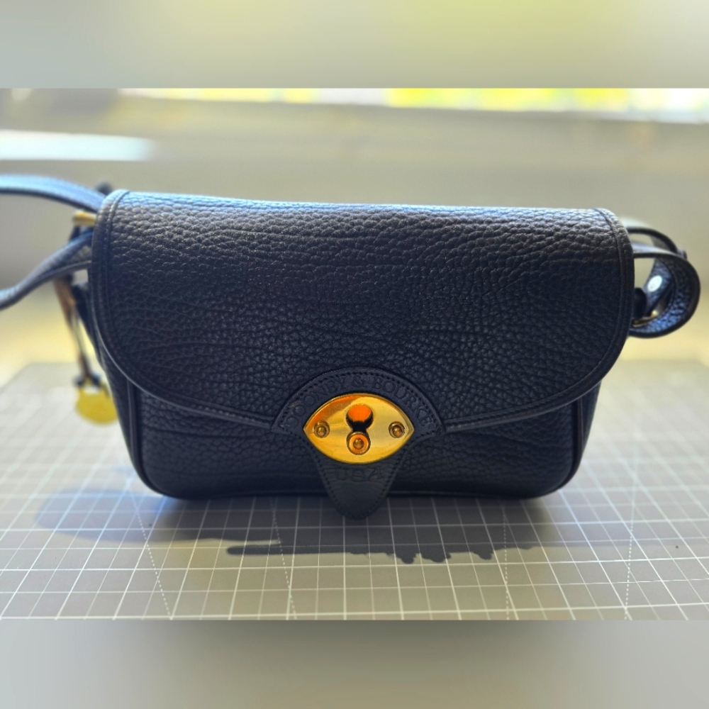 Vintage Dooney & Bourke USA black leather crossbody bag with gold hardware